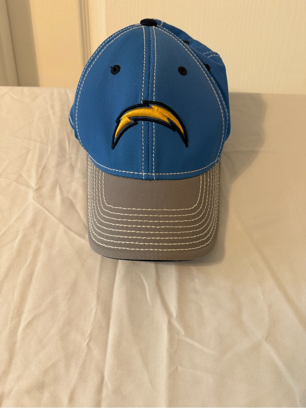 NFL Blue and Gray Baseball Cap with Yellow Lightning Logo